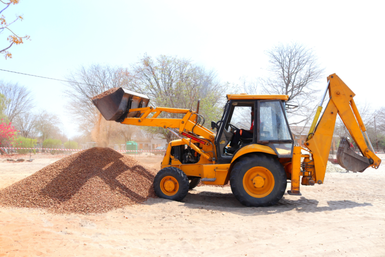Excavator operator practising machine control before assessment